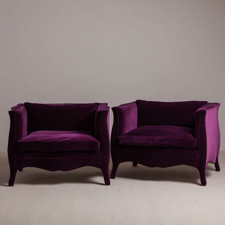 A Standard Pair of French Style Plum Velvet Upholstered Armchairs by Talisman Bespoke. These original, stylish and generously proportioned French style armchairs suit any interior.  Available in a variety of fabrics, this armchair design can be