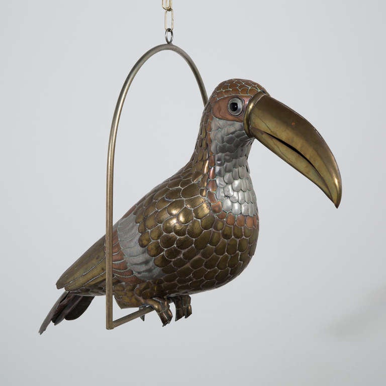 A Copper, Brass and Aluminium Toucan on a Stand by Sergio Bustamante, 1970s