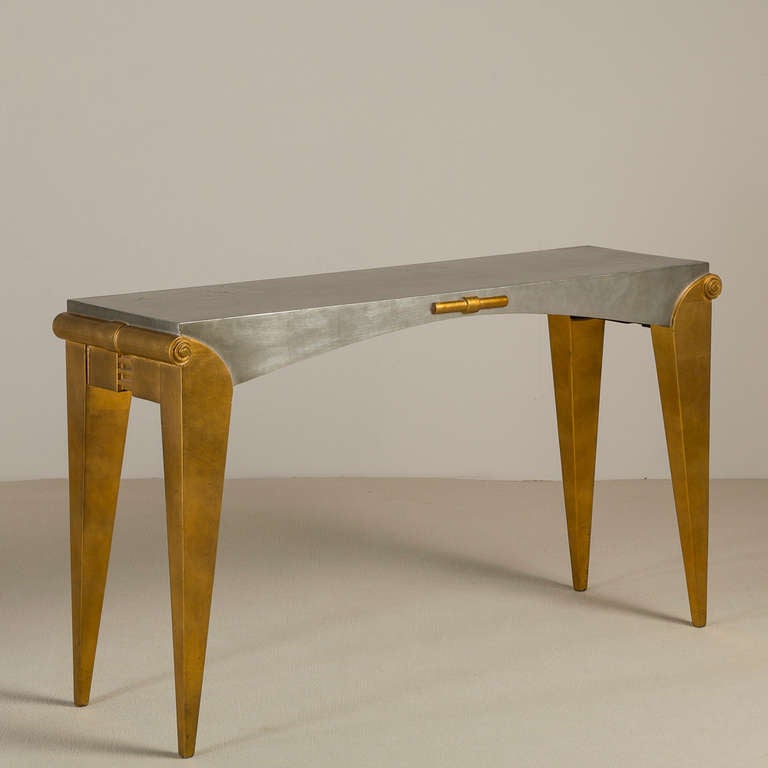 A Vintage Donghia designed Silver and Gold Leafed Console Table and Mirror USA, 1980s