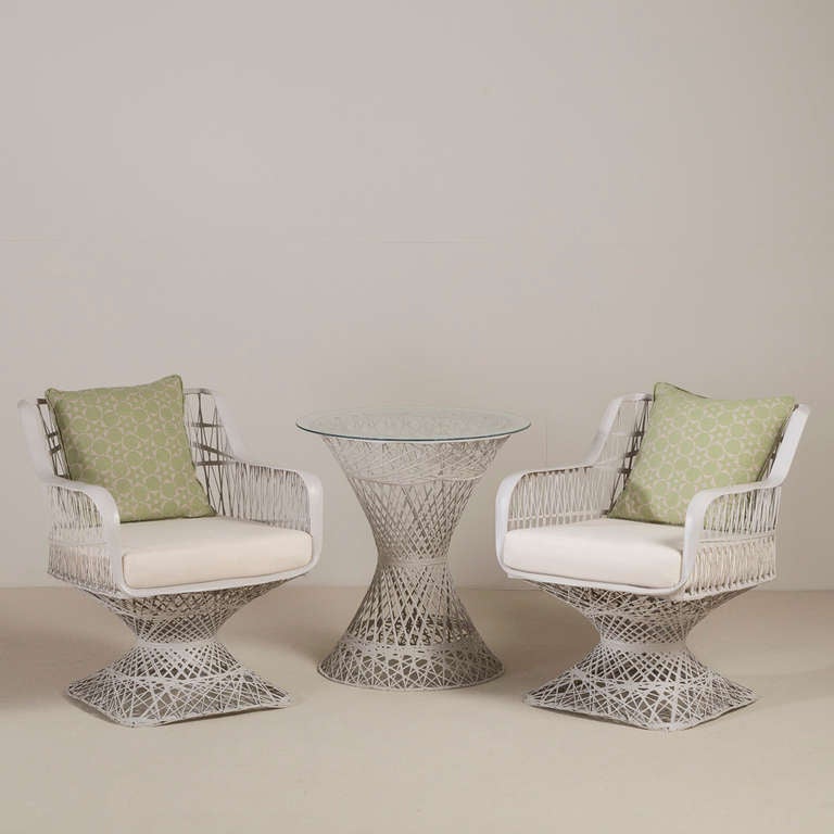 A Pair of Spun Armchairs with Curved Arms and Square Bases USA 1960s