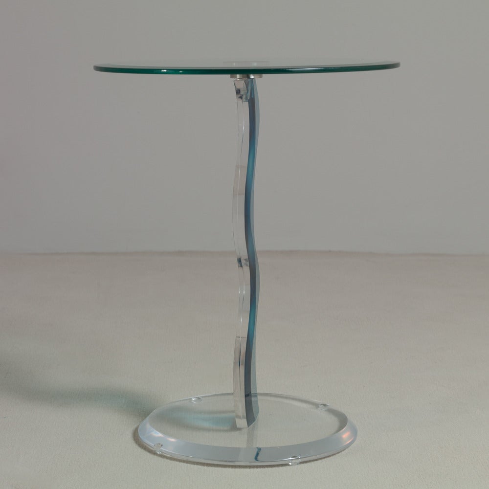 A sculptural aqua and clear Lucite side table with glass top, 1970s.