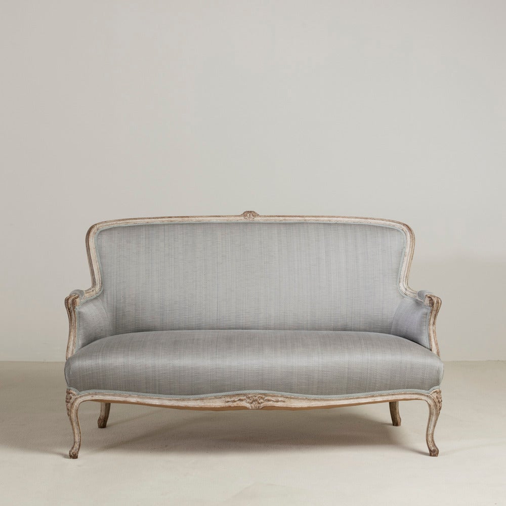 A 19th century Swedish Rococo Revival two-seat Swedish sofa reupholstered by our team.
