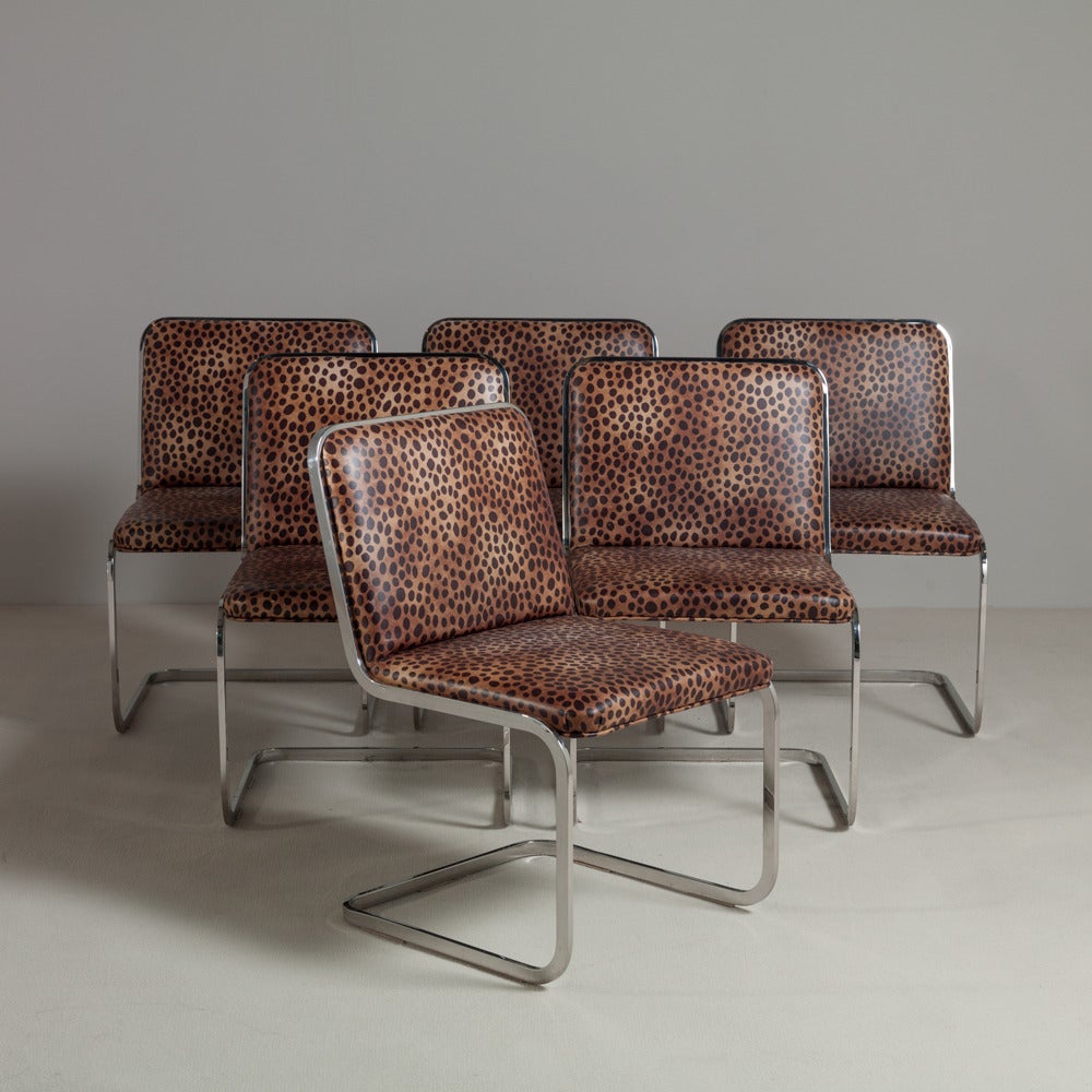 Set of six chromium steel framed cantilevered dining chairs upholstered in a its original leopard print vinyl 1960s.
 
