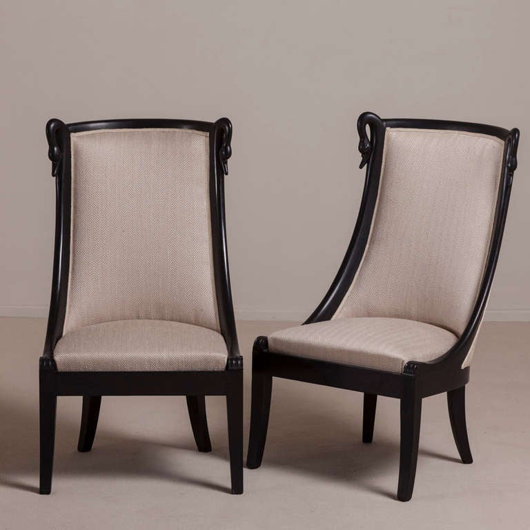 A Pair of Empire Style Ebonised Framed Occasional Chairs with Swan Motif 1960s reupholstered by Talisman

Seat Height 35.5 cm