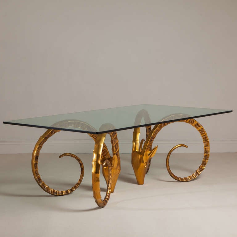 A Pair of Gilt Rams Head Dining Table Bases after Chervet with a Large Glass Top 1960s