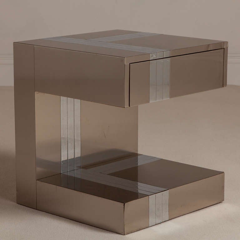 A 'C' Shaped Brushed Aluminium and Polished Chrome End Table in the manner of Paul Evans USA ,1980, Featuring a single drawer. Vintage Condition.