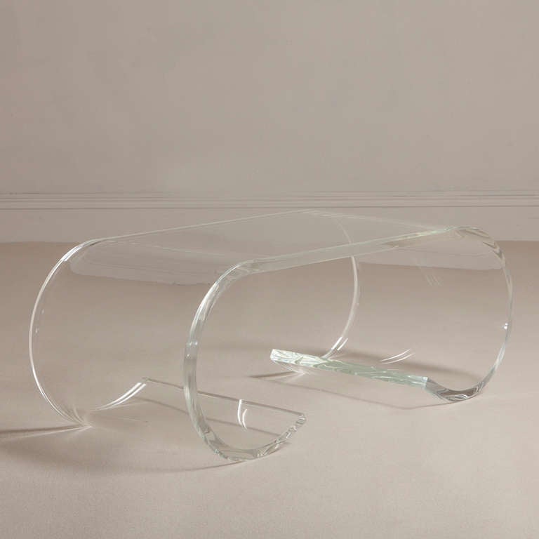 A Thick Lucite Scroll Form Coffee Table by Paul Jones 1970s