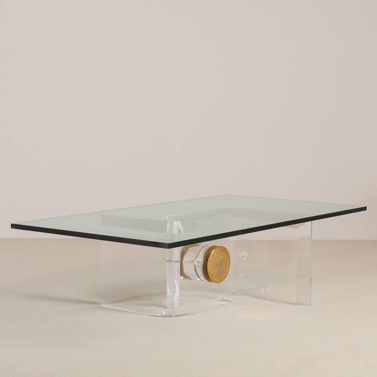 A Heavy Lucite 'S' Shaped Coffee Table Base with Chunky Brass Bolt Structural Detail, circa 1970s. Without Glass Top.

Glass can be supplied at cost.

