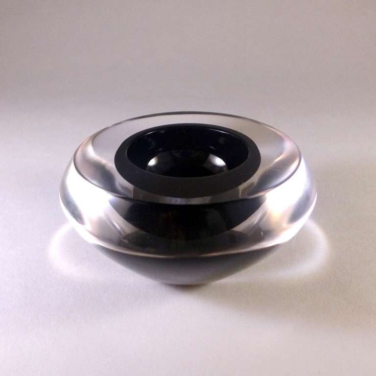 A Small Round Black and Clear Glass Sommerso Glass Ashtray