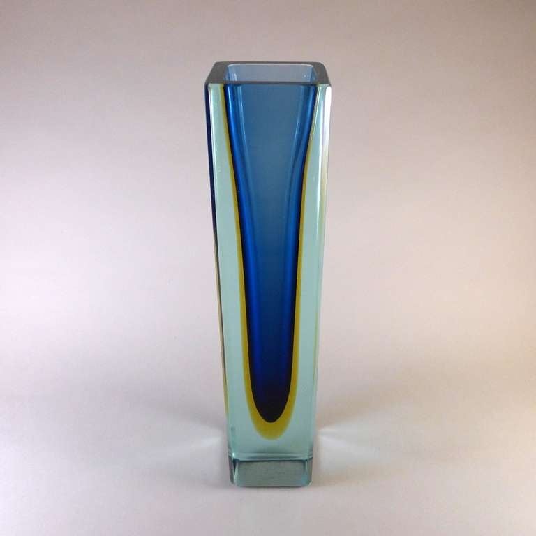 A tall square Murano Sommerso glass vase with a blue and gold center cased in pale turquoise.