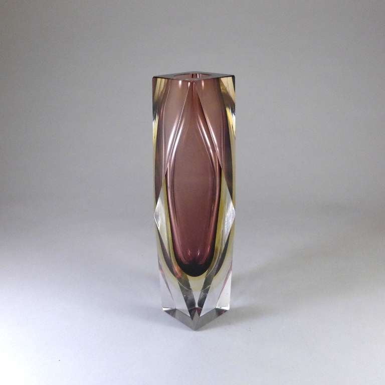 A faceted Murano Sommerso glass vase with a plum and gold centre cased in clear glass
This piece was retailing at £750 but has been reduced due to a large chip to the base.