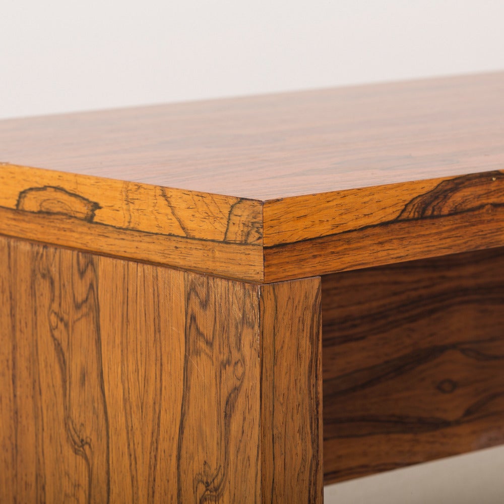 A rosewood veneered coffee table, 1970s stamped.