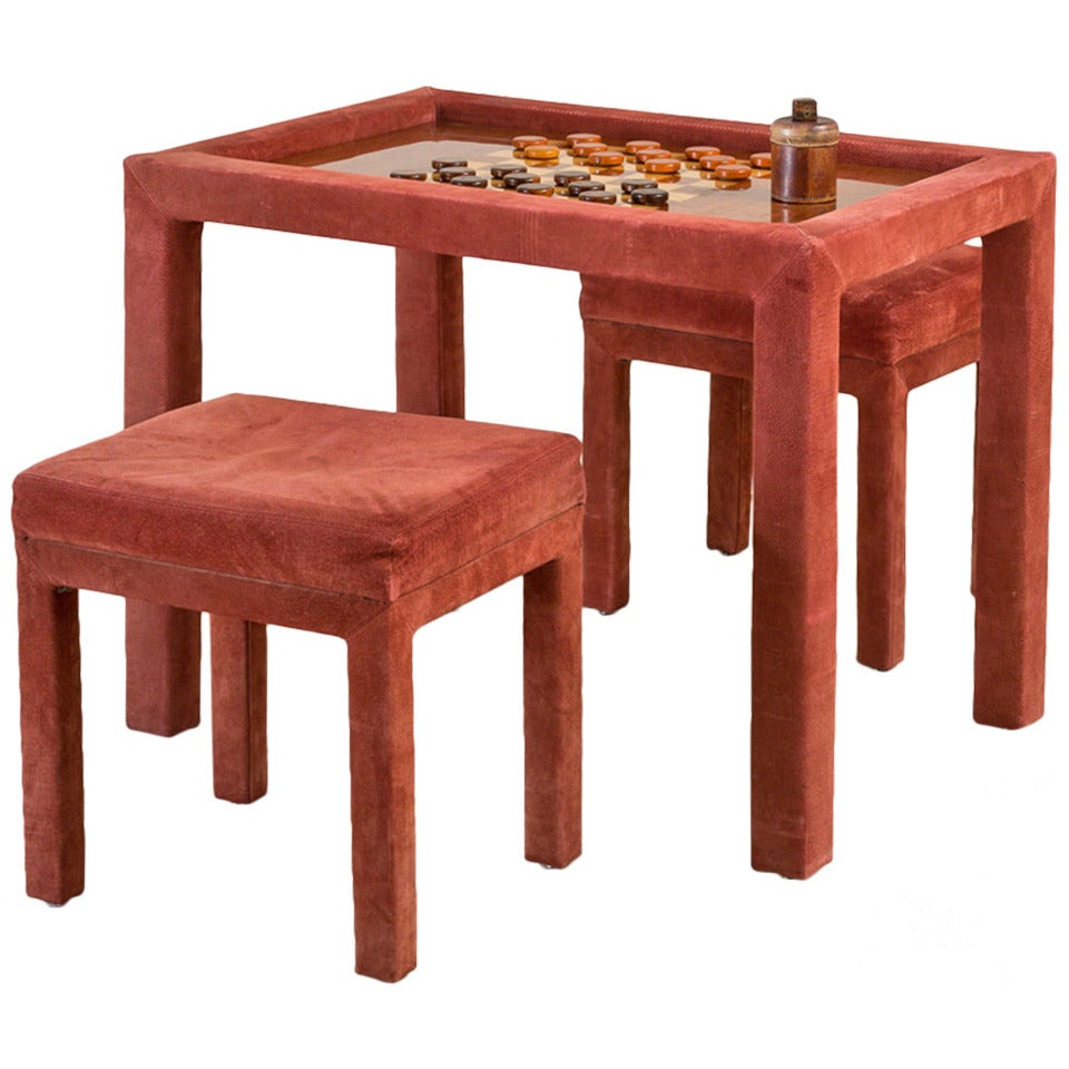 A Red Suede Wrapped Games Table and Stools 1980s