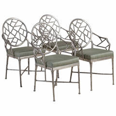 A Set of Four Faux Bamboo Polished Aluminium Carver Chairs 1960s