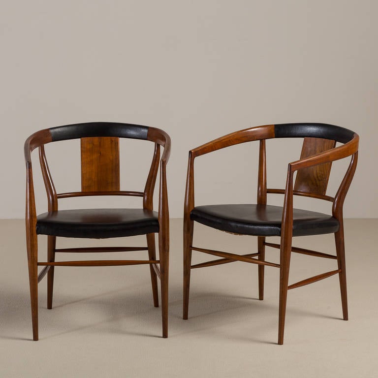 A pair of Danish style armchairs with black padding

Prices include 20% VAT which is removed for items shipped outside the EU.