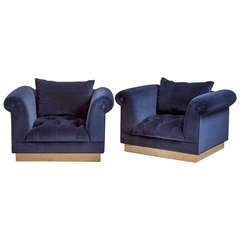 A Standard Pair of Deep Buttoned Armchairs by Talisman