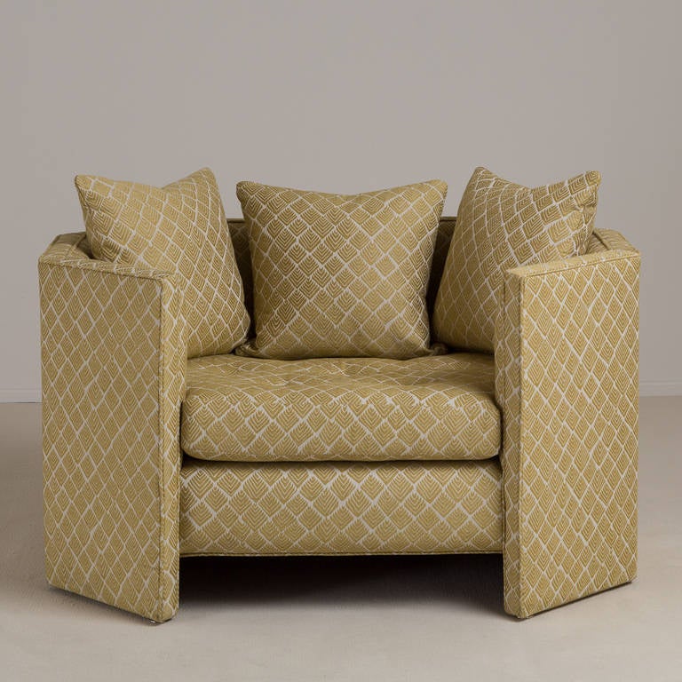 A single octagonal framed upholstered armchair by Talisman Bespoke. 
These comfortable and impressive armchairs are based on the popular Talisman Bespoke octagonal sofa. 
Available in a variety of fabrics, this design can be adapted to a customised