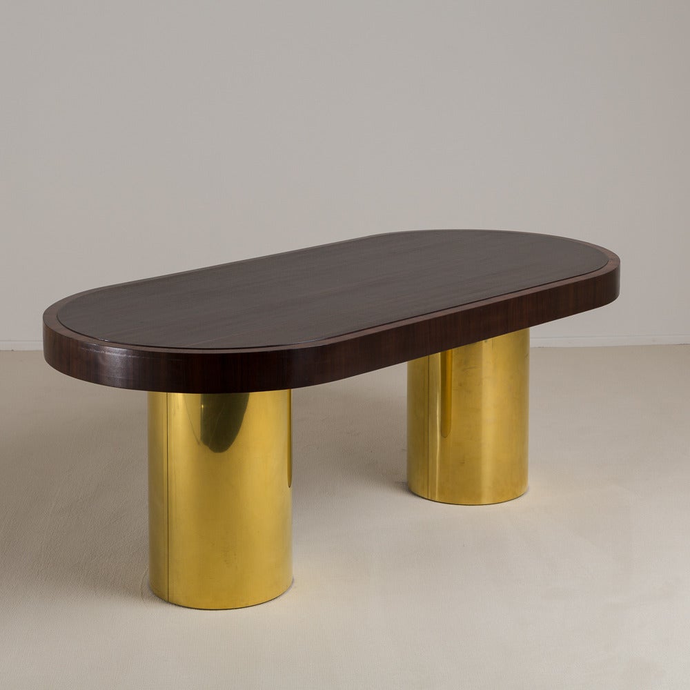 An English Art Deco double pedestal brass based table with Veneered top, Talisman Edition

Prices include 20% VAT which is removed for items shipped outside the EU.