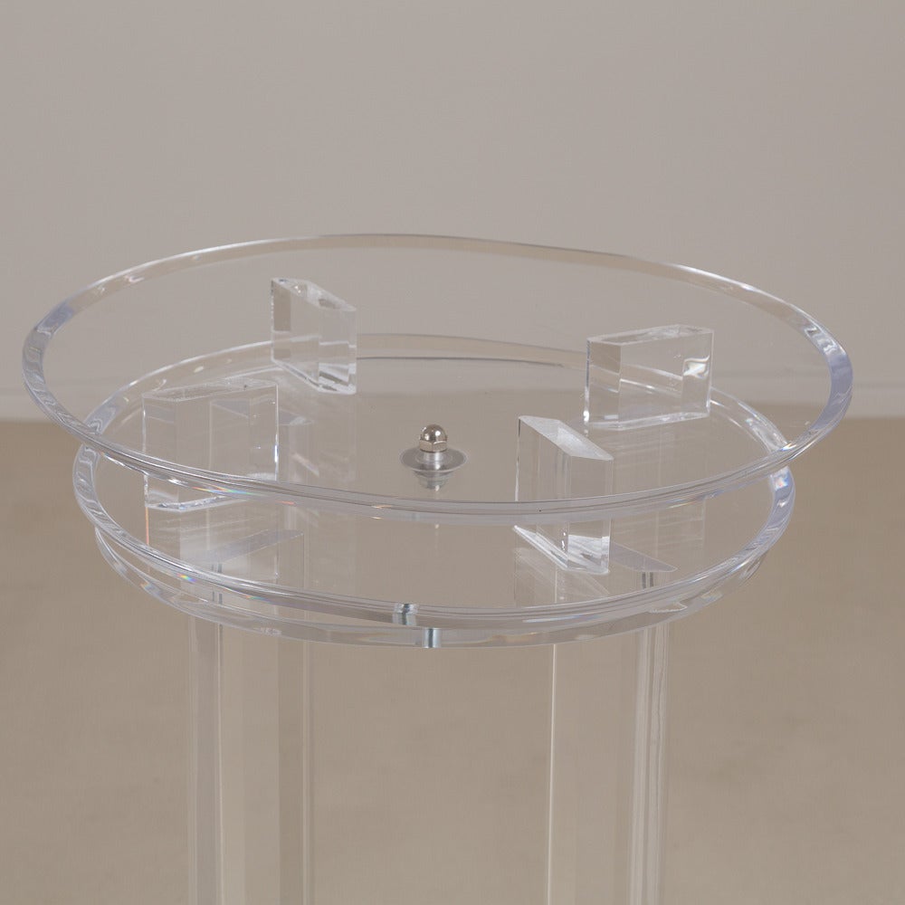 A Tall Lucite Pedestal with an Oval Revolving Top 1970s 1