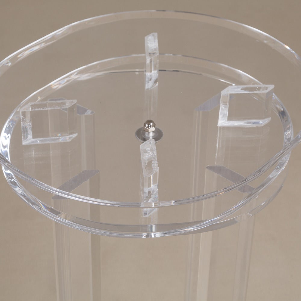 A Tall Lucite Pedestal with an Oval Revolving Top 1970s 2