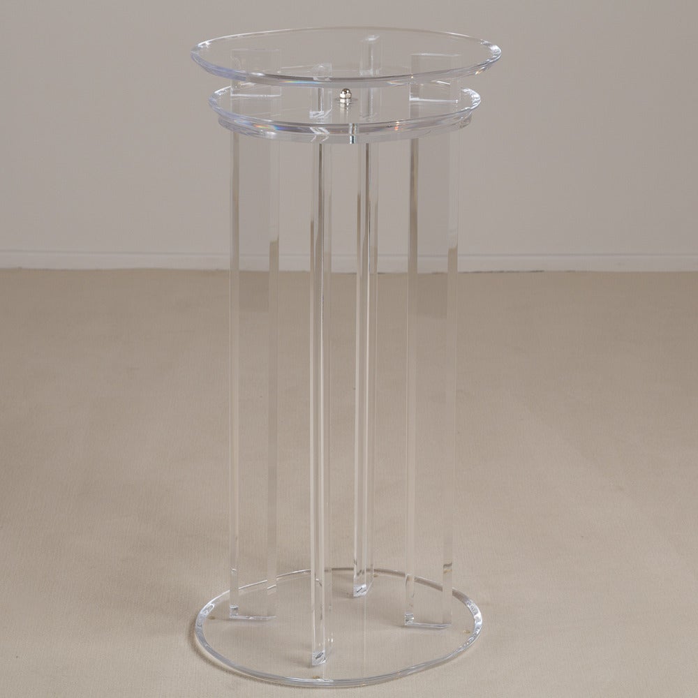 A Tall Lucite Pedestal with an Oval Revolving Top 1970s