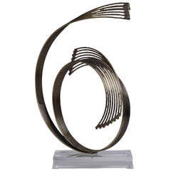 A Curtis Jere Metal Table Sculpture on Lucite Base