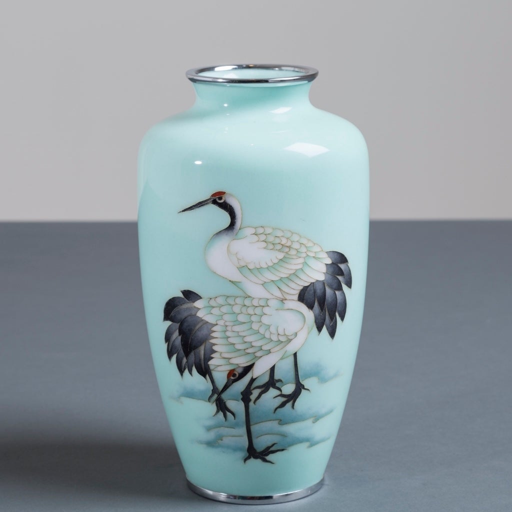 A Japanese cloisonné turquoise enamel vase depicting two cranes attributed to inarba, circa 1960 (KM026).

NB: These items are subject to a further discount over and above the trade when exported outside the EU of 10%.