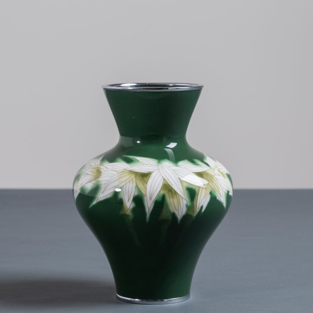 A Japanese cloisonné green enamel vase with bamboo leave around the shoulder by Ando, circa 1950 