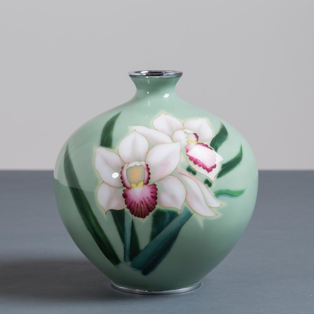 A Japanese Cloisonne´green enamel vase with orchids attributed to Ando, circa 1950 