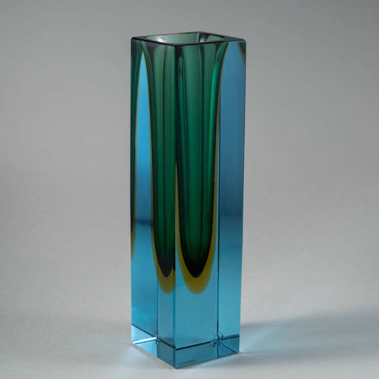 A rectangular Murano Sommerso glass vase with a green and gold centre cased in blue glass.