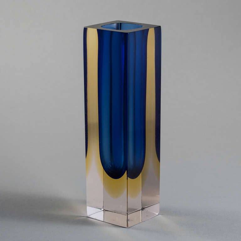 A rectangular Murano Sommerso glass vase with a blue and gold centre cased in tinted glass.