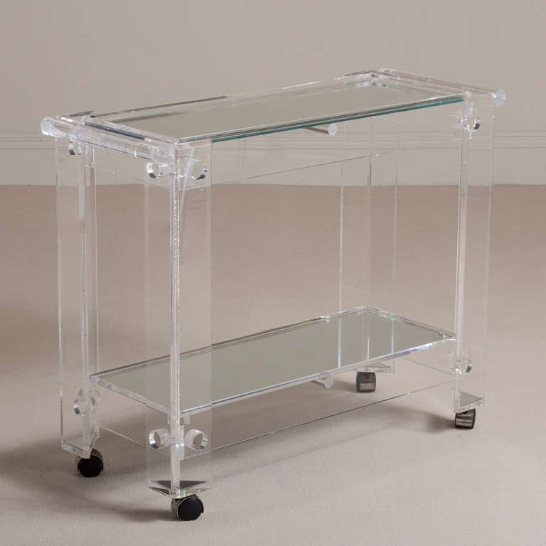 A Lucite Barcart with Mirrored Glass Top on Castors 1970s