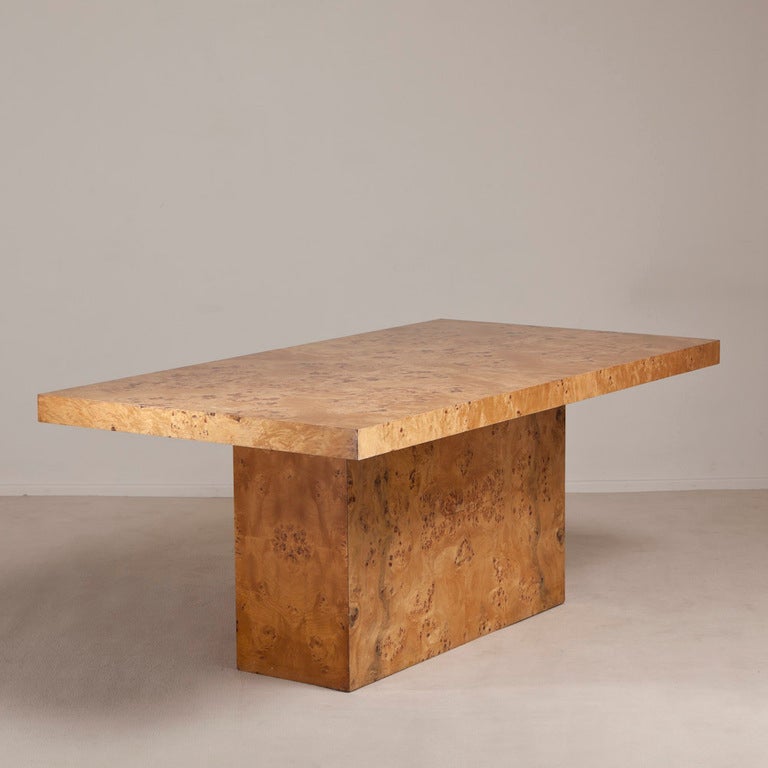 A Milo Baughman designed Pedestal Based Burlwood Veneered Rectangular Extendable Dining Table USA 1970s, the two leaves are stored within pedestal base when not in use.