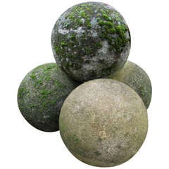 A Set of Four Matched Cotswold Stone Balls