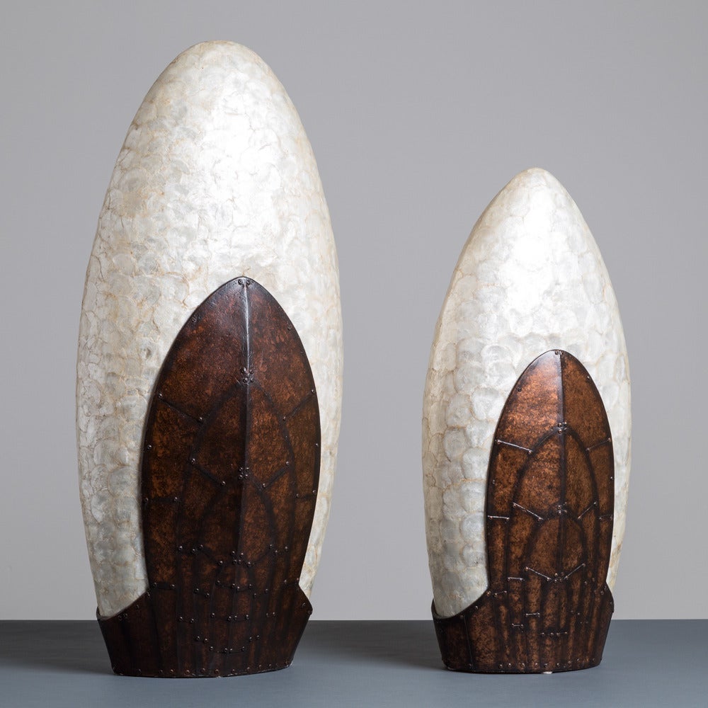A Pair of Large Graduated Capiz Shell Lamps 1960s

Smaller one measures: 80cms x 26cms x 19cms (h x w x d) 33cms width at widest point