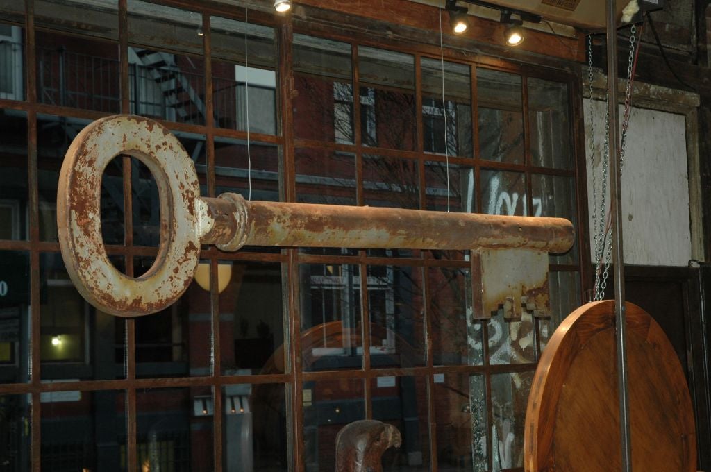 American, early 20th century trade sign, depicting an extremely large key.  Unique with excellent old patina, perfect piece of folk art.