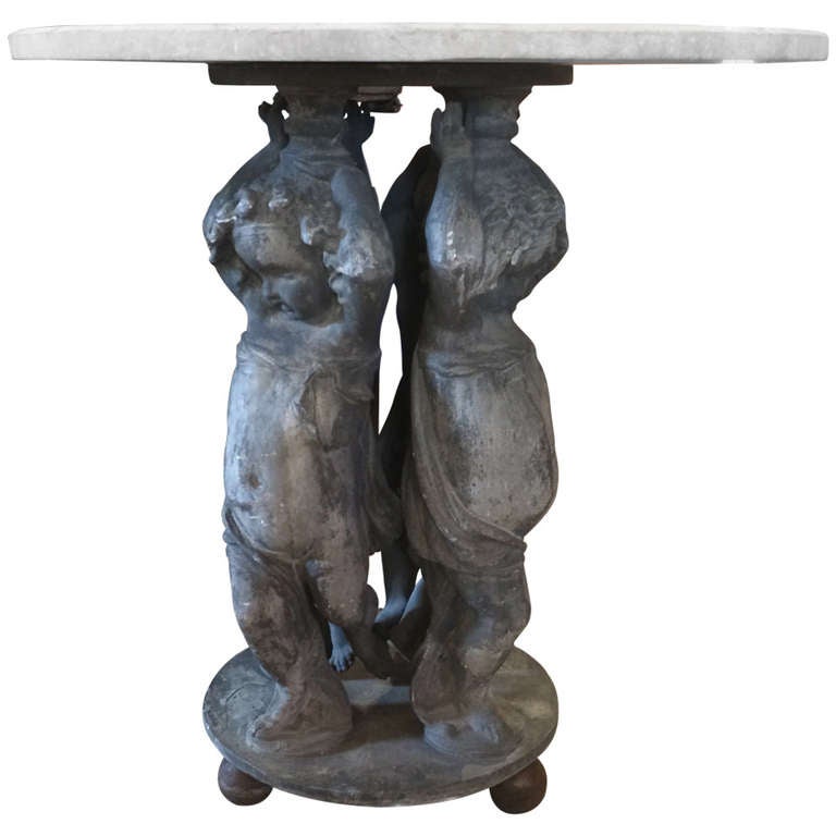Marble-Top Garden Table with Lead Cherub Base