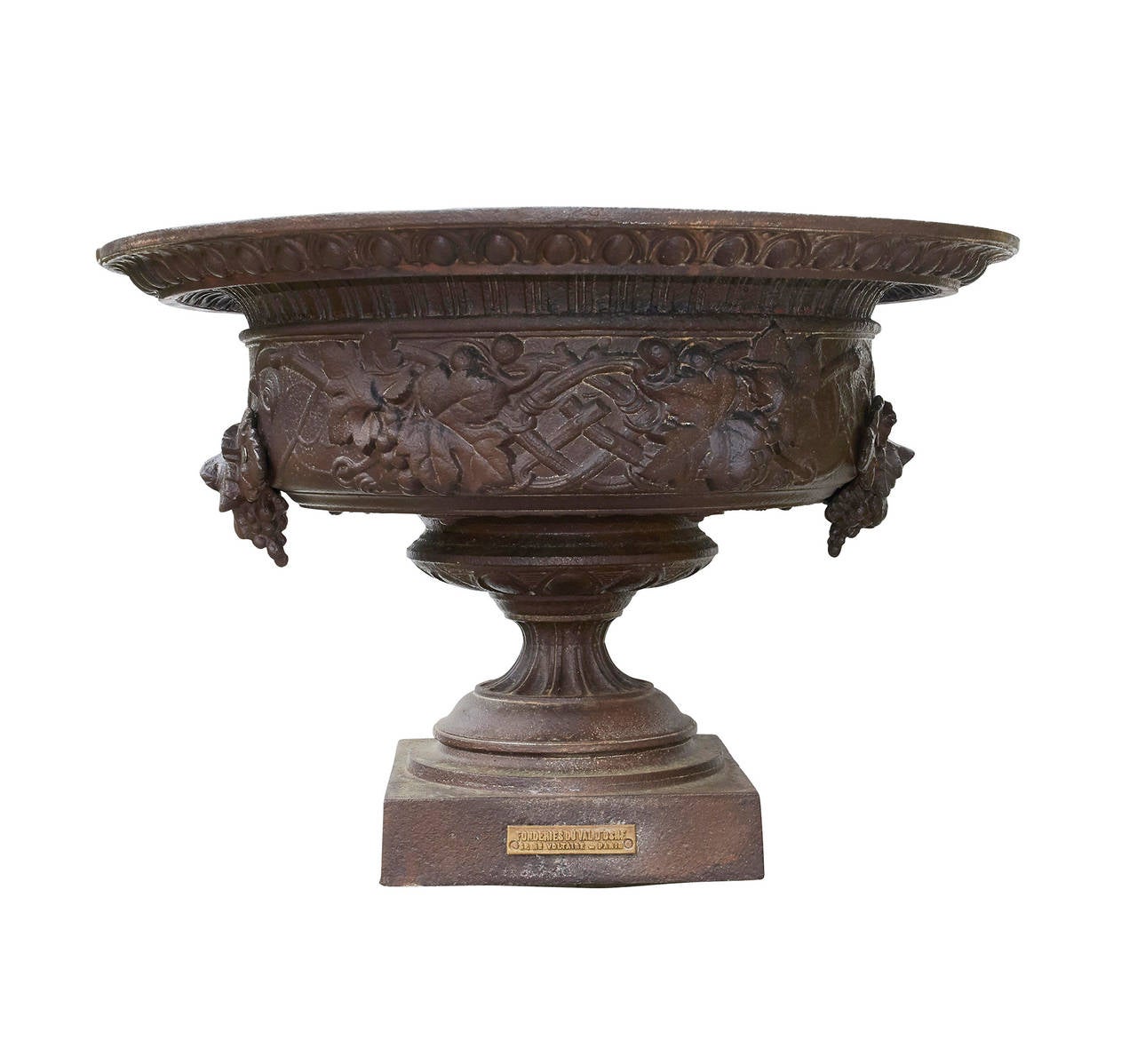 Late 19th century cast iron urns by the Val D'Osne Foundry. Unique form with applied floral decoration. Applied Foundry plaque indicates these were probably exposition pieces.
Measures: Opening 16 in.
Diameter 26 in.
Base 10.25 in. sq.
Height 18