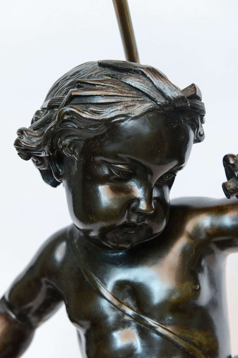 Pair of 19th Century French Patinated Bronze Statues of Putti For Sale 3