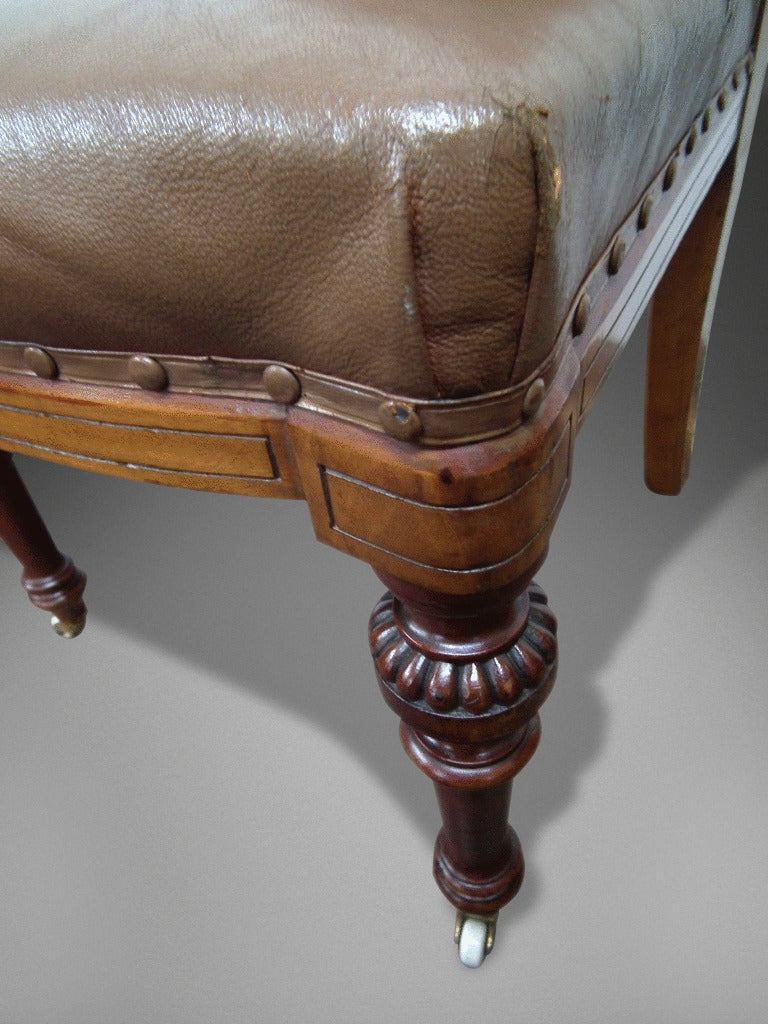 A Rare Set of 24 19th Century Dining Chairs of the Finest Quality

Carved in Selected Walnut and Retaining the Original Putty Coloured Leather