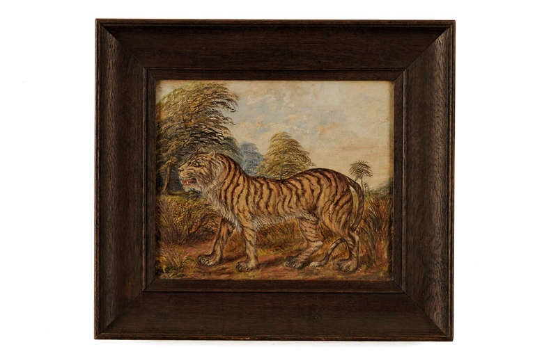 A Pair Of Paintings Depicting A Lion and Tiger In A Forest Landscape