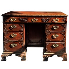 Small Mahogany Desk With Carved Detail And Brass Handles