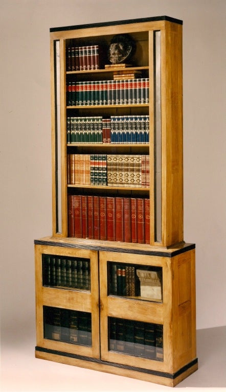 A Set of Four Pale Oak and Ebonised Oak Bookcases.

Please note: the price is per pair