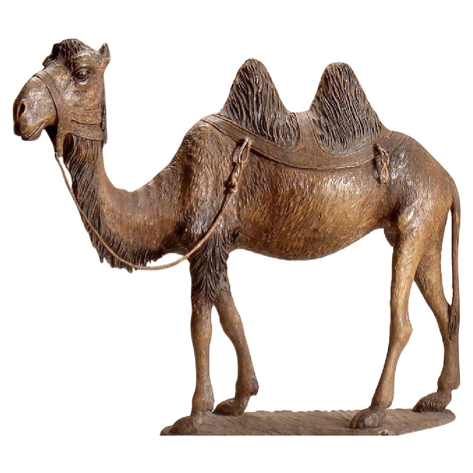 A Continental Stained and Polychrome Decorated Wood Model of A Camel For Sale