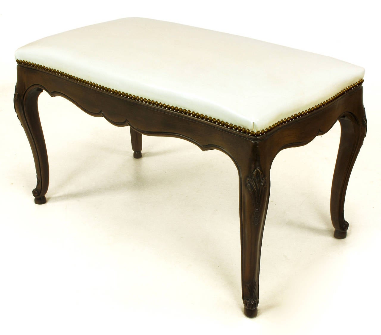 Kindel Furniture of Grand Rapids vintage cabriole leg walnut bench with French Regency carved detailing and white leather seat with brass nailhead appointments.