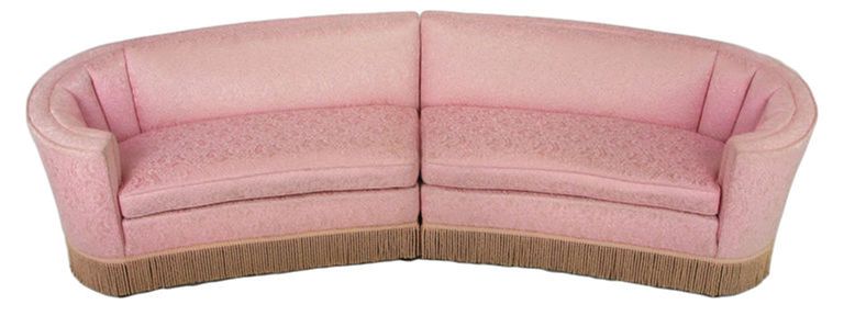 Elliptical two piece sectional sofa in original pink damask upholstery. Curved sides are channeled, also feature corded skirting. Tapered square walnut legs are perfect for a skirtless look as well.

Can be reupholstered C.O.M., for 1500.00