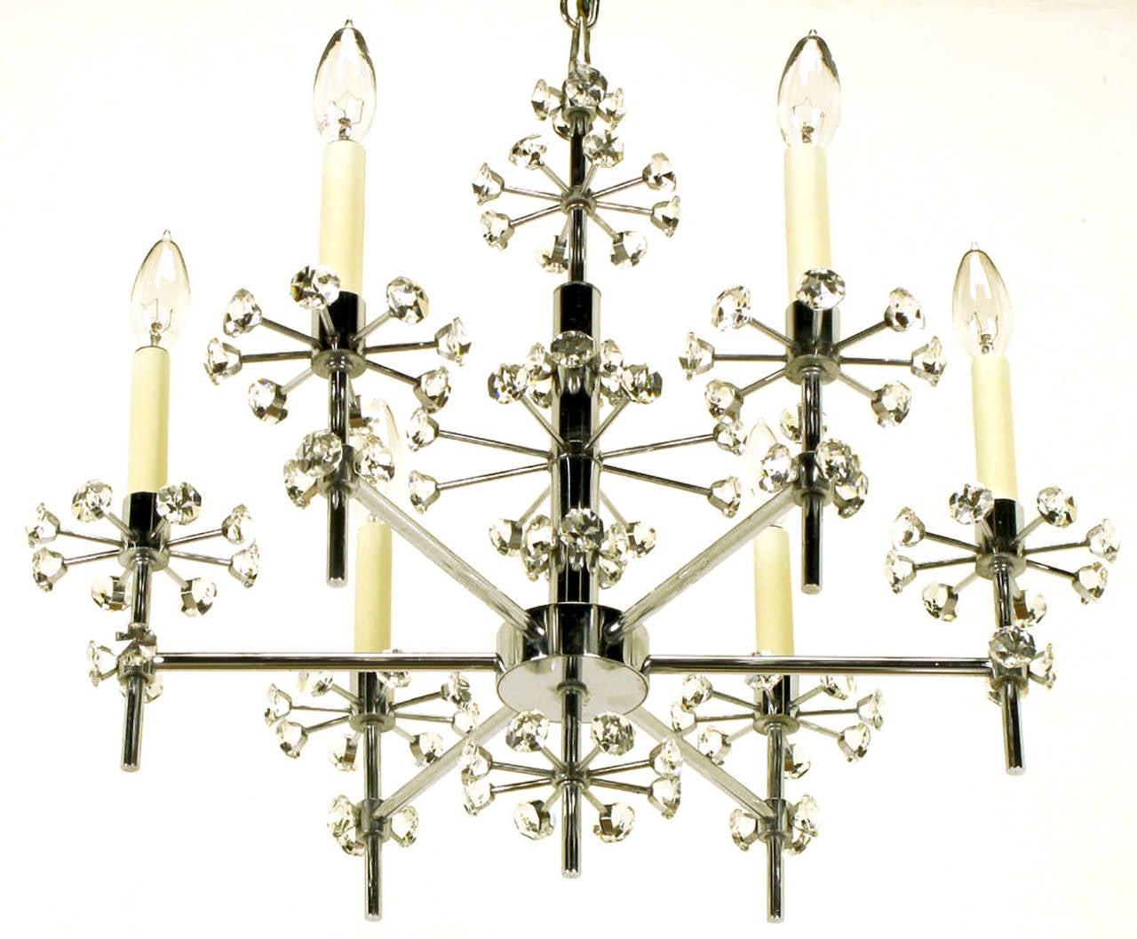 Unusual chrome six-arm chandelier with orbital crystal details that extend from the risers and centre stem on metal bars. Made in Canada, where Lightolier had midcentury production. Sold with chain and canopy. Pair available. Chandelier body height