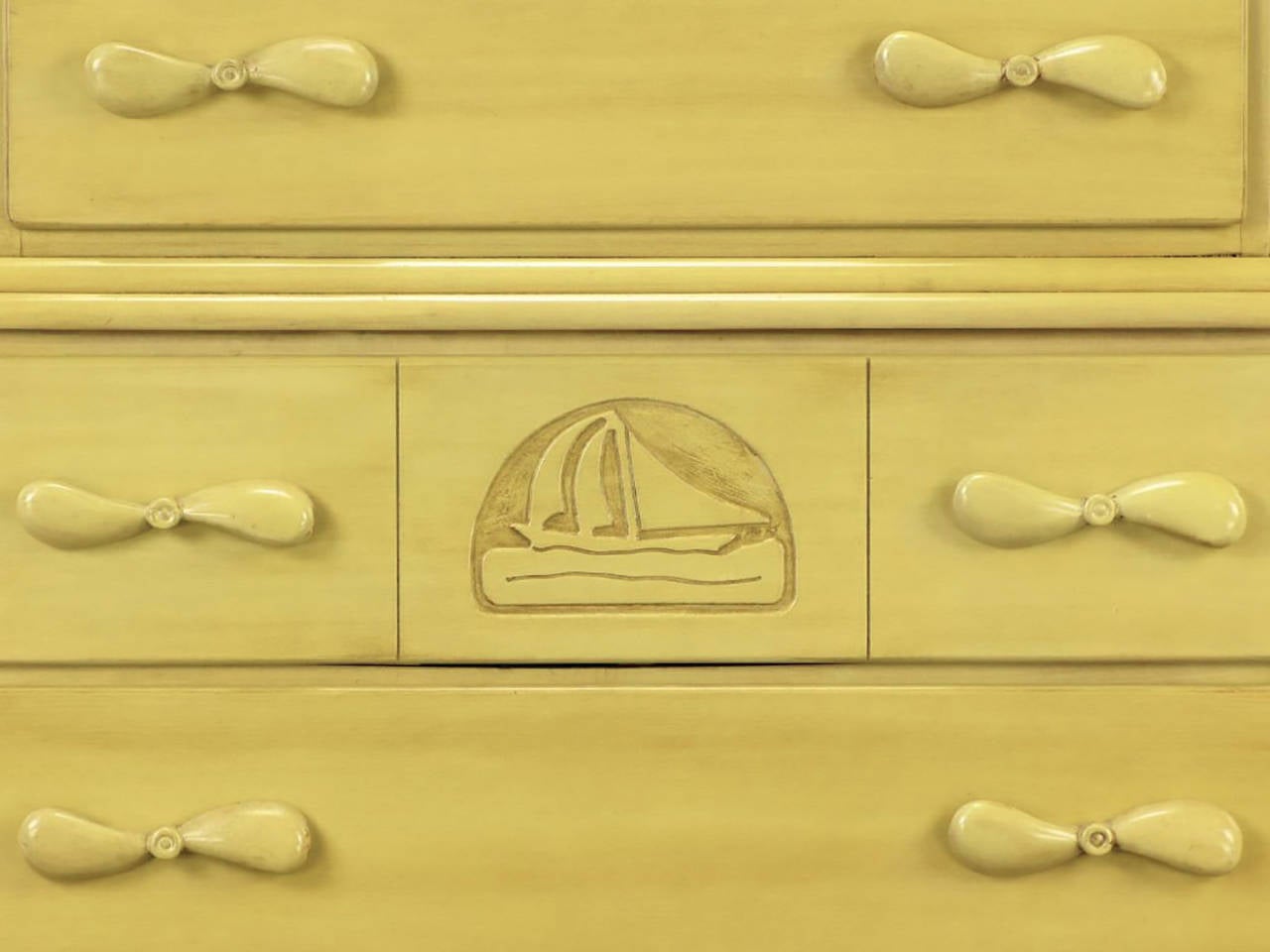 Mid-20th Century Pair of Five-Drawer Tall Chests with Propeller Pulls and Sailboat Reliefs