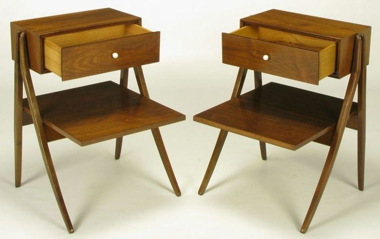 Restored to better than new condition, unbelievably rare pair of A-frame figured walnut nightstands by Kip Stewart and Stewart MacDougall for their Drexel Declaration collection. Top floating drawer with original porcelain ball pulls and brass