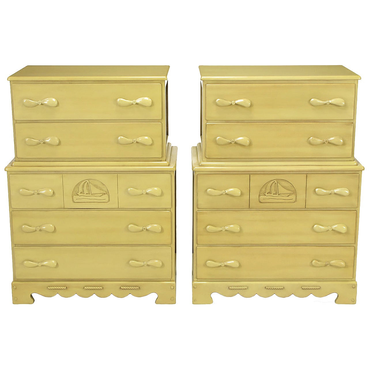 Pair of Five-Drawer Tall Chests with Propeller Pulls and Sailboat Reliefs